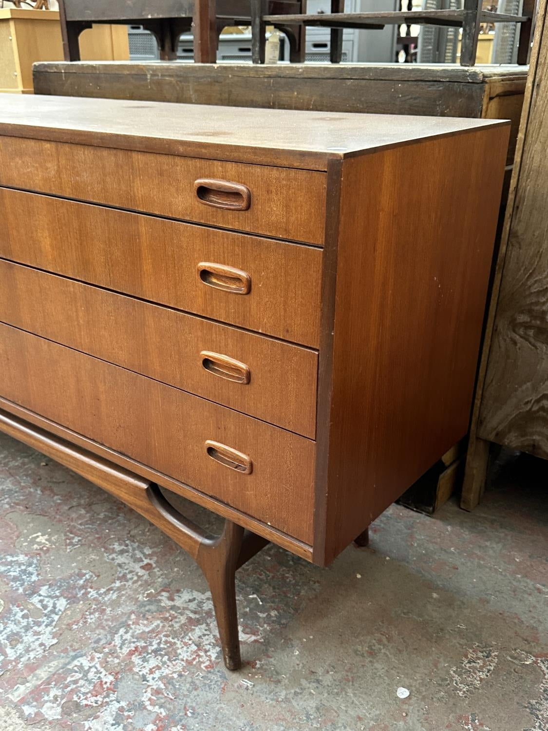 A mid 20th century Greaves & Thomas teak sideboard - approx. 79cm high x 176cm wide x 43cm deep