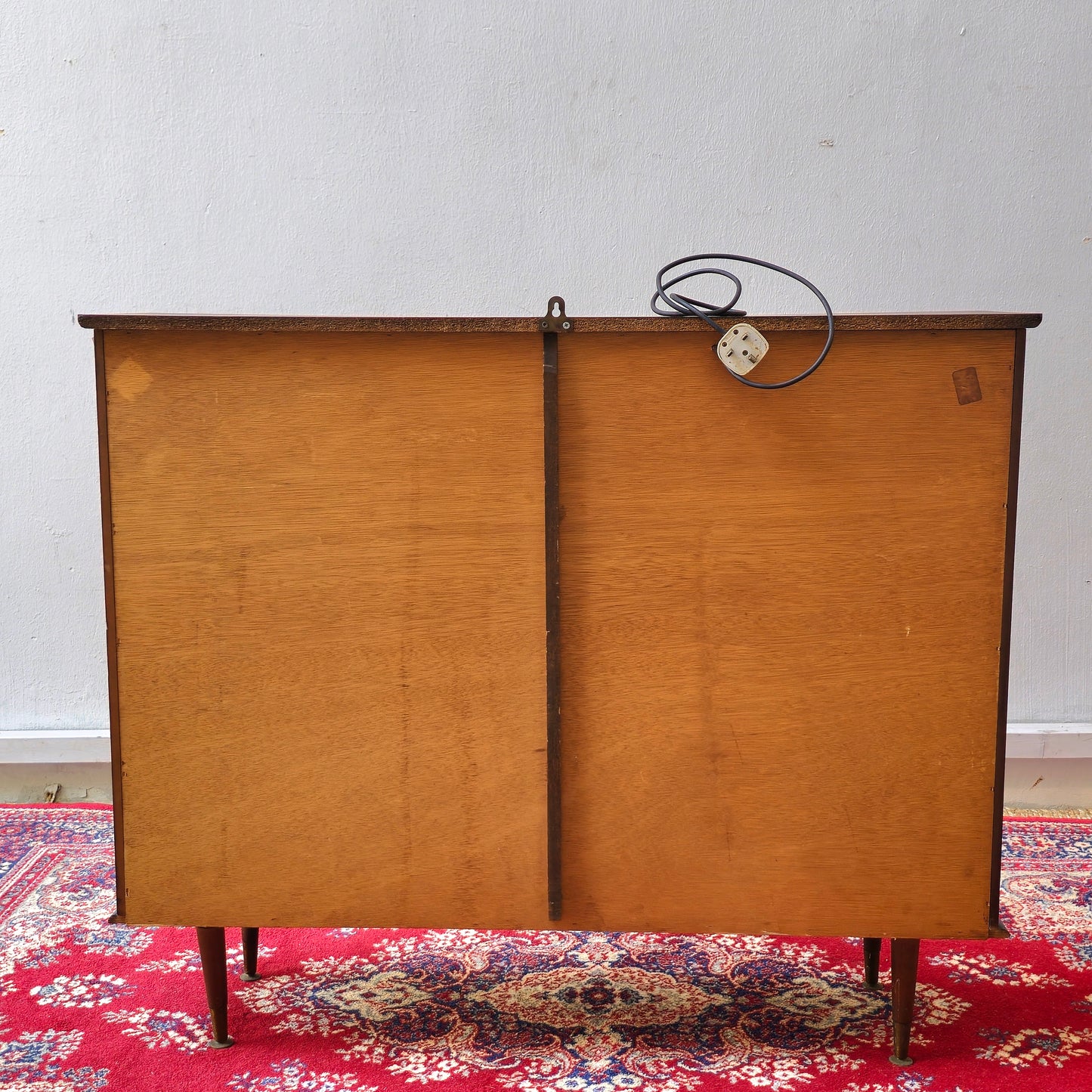 A Hubbinet 1960's glass display cabinet