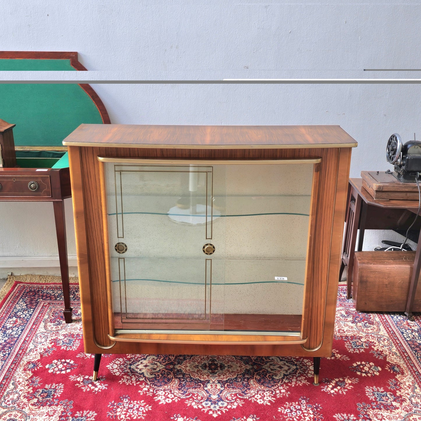 Vintage English display cabinet with teak compass legs, 1970