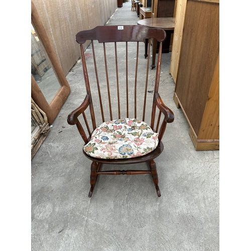 A MAHOGANY ROCKING CHAIR