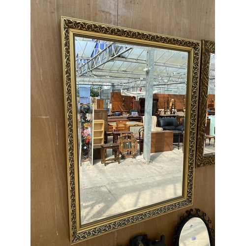 A VINTAGE GILT FRAMED WALL MIRROR WITH BEVEL EDGE, 45" X 35"