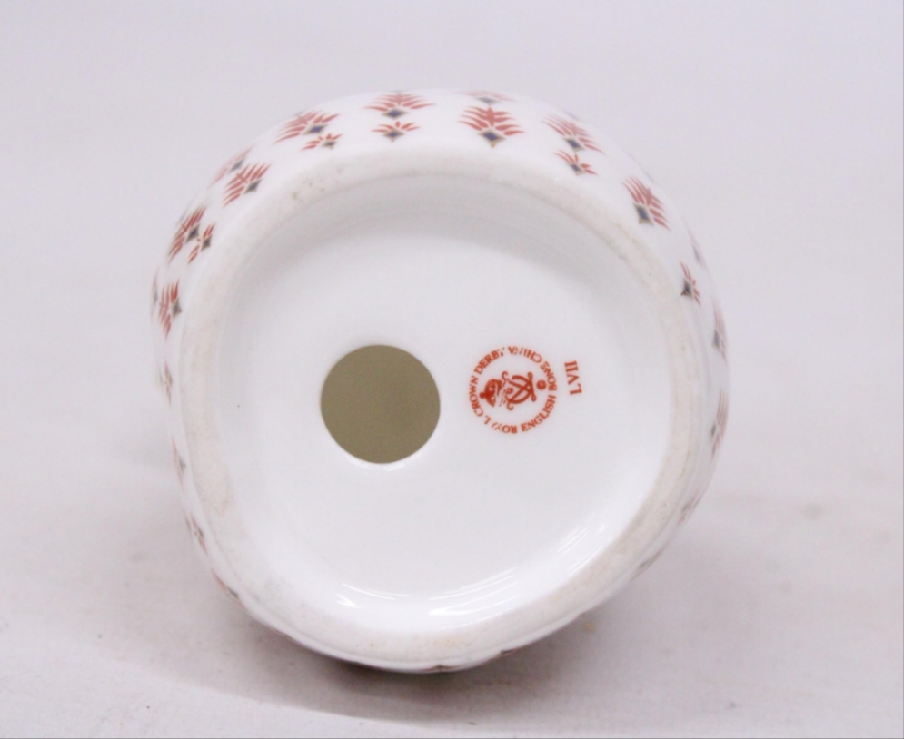 A ROYAL CROWN DERBY Handpainted figurine collection