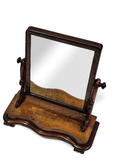 Victorian mahogany toilet mirror on a serpentine base