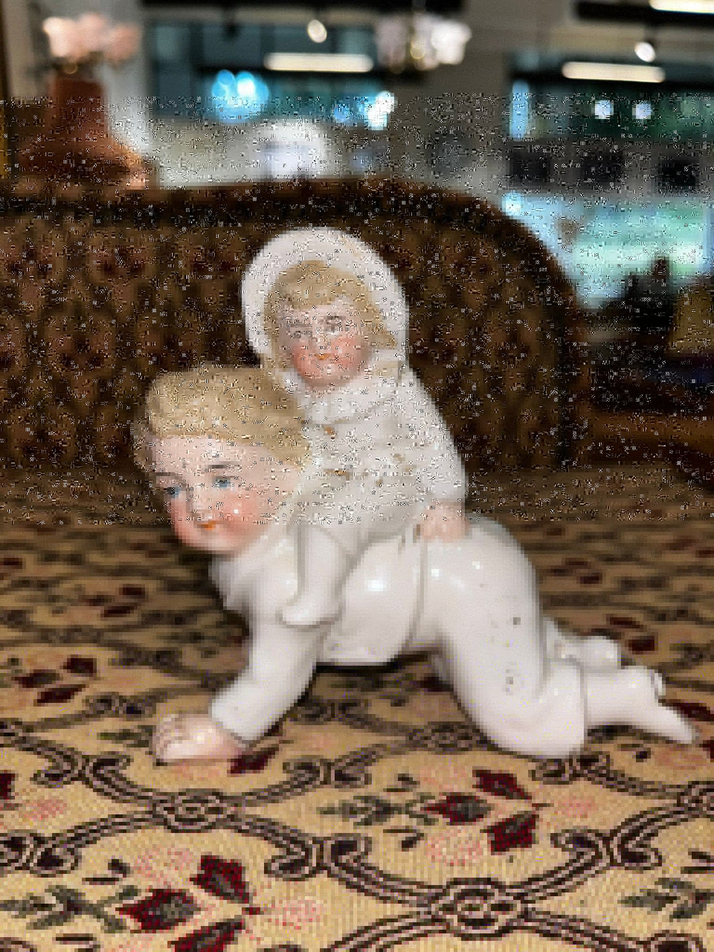 Antique Bisque Porcelain Figurine: Baby Riding on a Crawling Infant
