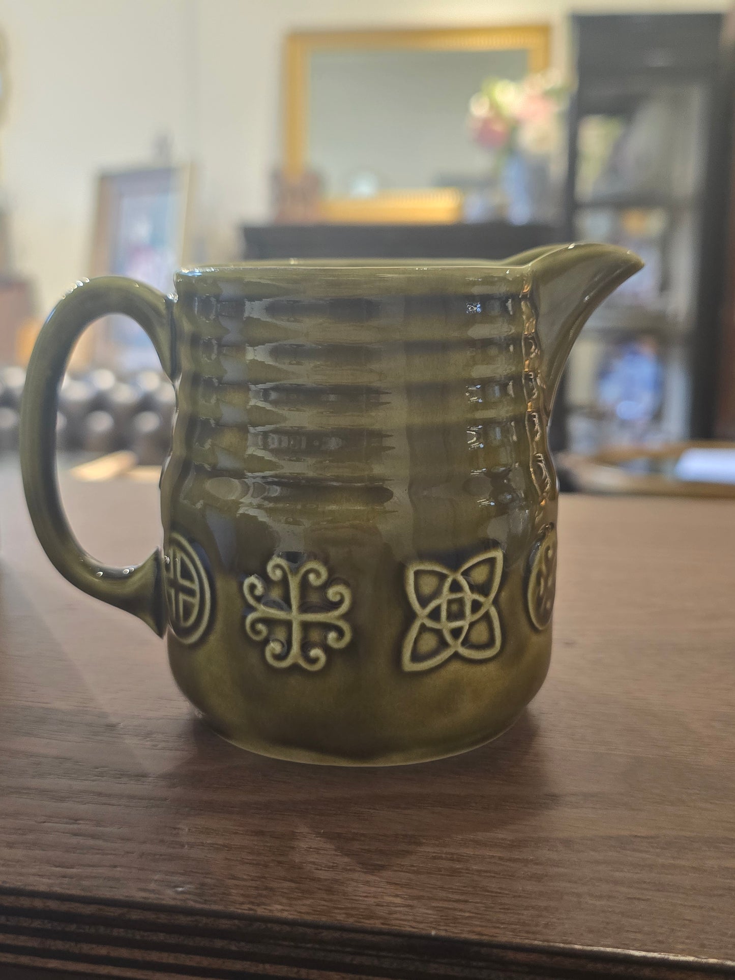 Green ceramic milk jar