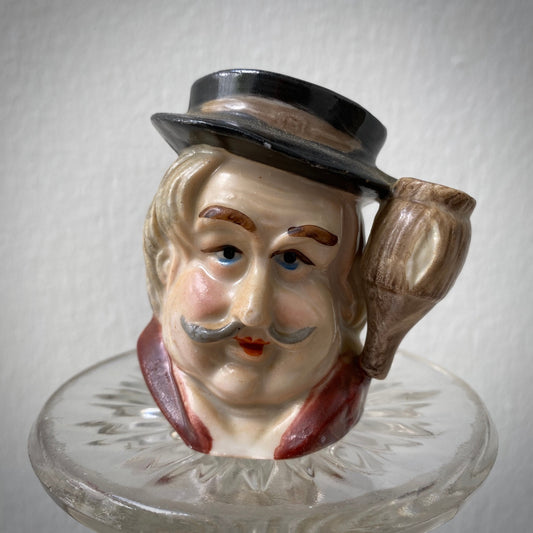 Vintage English Toby Jug creamer pot featuring a lamplighter character.