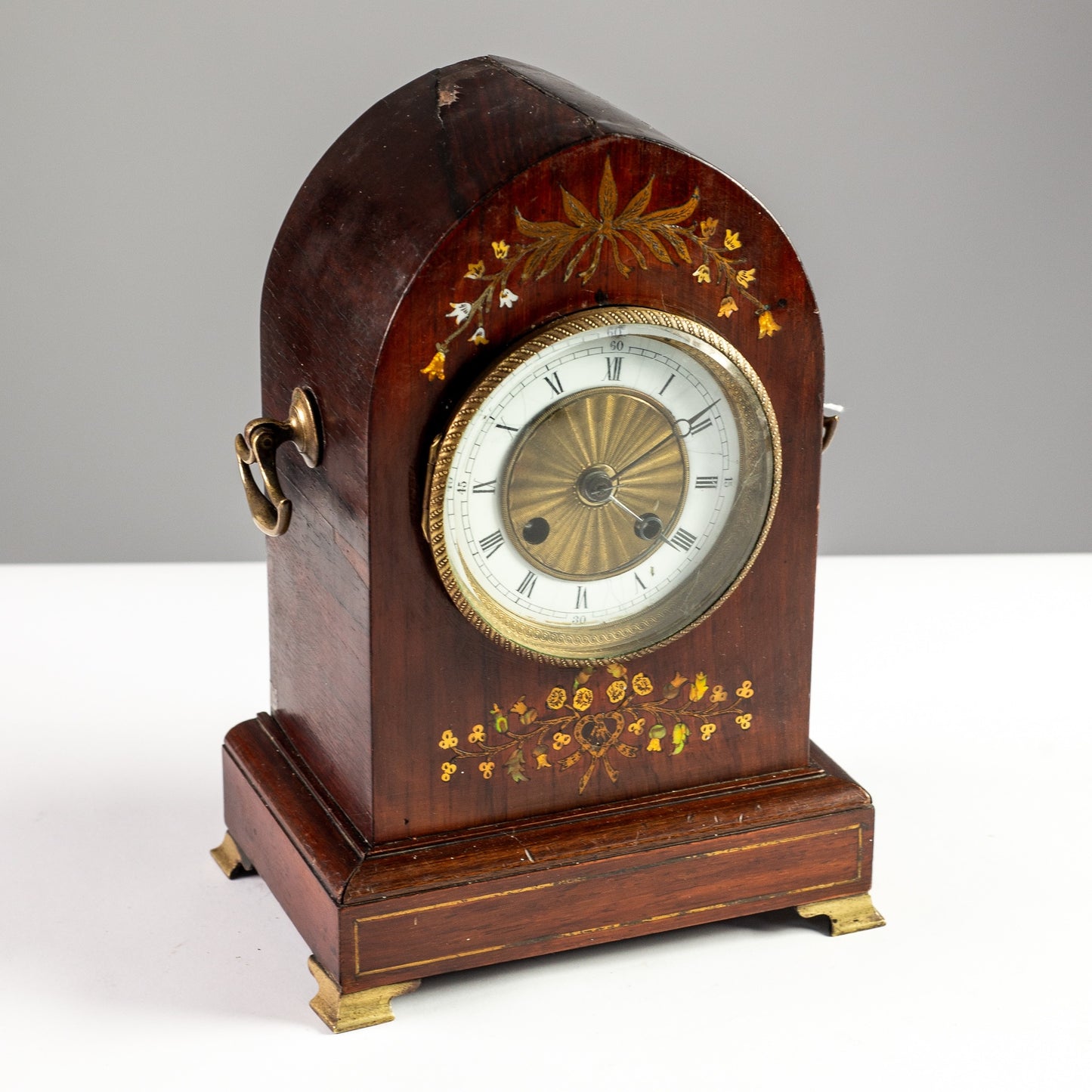 LATE VICTORIAN BRASS AND MOTHER OF PEARL INLAID LANCET TOP MANTLE CLOCK