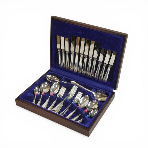Vintage Cooper Ludlam stainless steel forty-four piece cutlery set, housed in a blue velvet-lined wooden cased box, with Rothmans Collection label on the box.