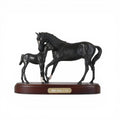Royal Doulton Black Beauty & Foal matt finish presented on a wooden plinth. H:-18cm (without plinth)