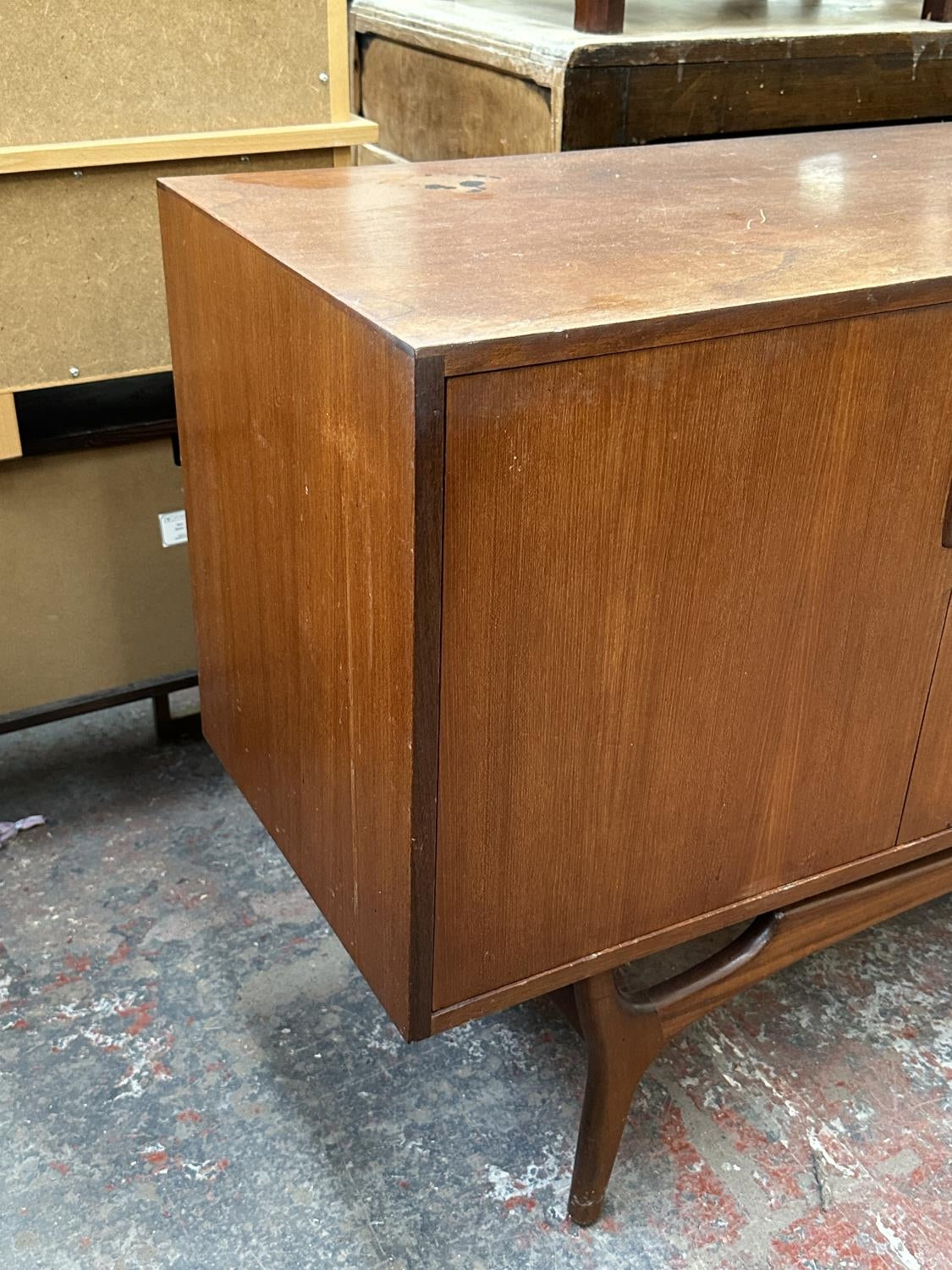 A mid 20th century Greaves & Thomas teak sideboard - approx. 79cm high x 176cm wide x 43cm deep