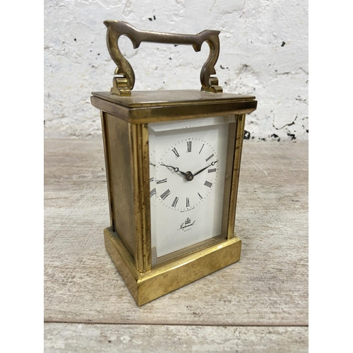 An Imperial brass cased quartz carriage clock - approx. 12cm high x 8cm wide x 6cm deep