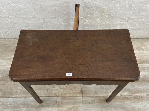 A George III mahogany fold over tea table - approx. 74cm high x 87cm wide x 42cm deep when closed