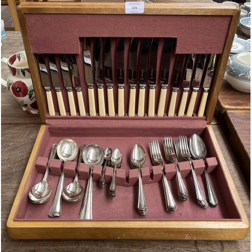 A mid 20th century cutlery canteen containing The Stainless Cutlery Co. Ltd.