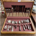 A mid 20th century cutlery canteen containing The Stainless Cutlery Co. Ltd.