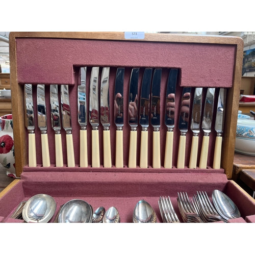 A mid 20th century cutlery canteen containing The Stainless Cutlery Co. Ltd.