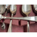 A mid 20th century cutlery canteen containing The Stainless Cutlery Co. Ltd.