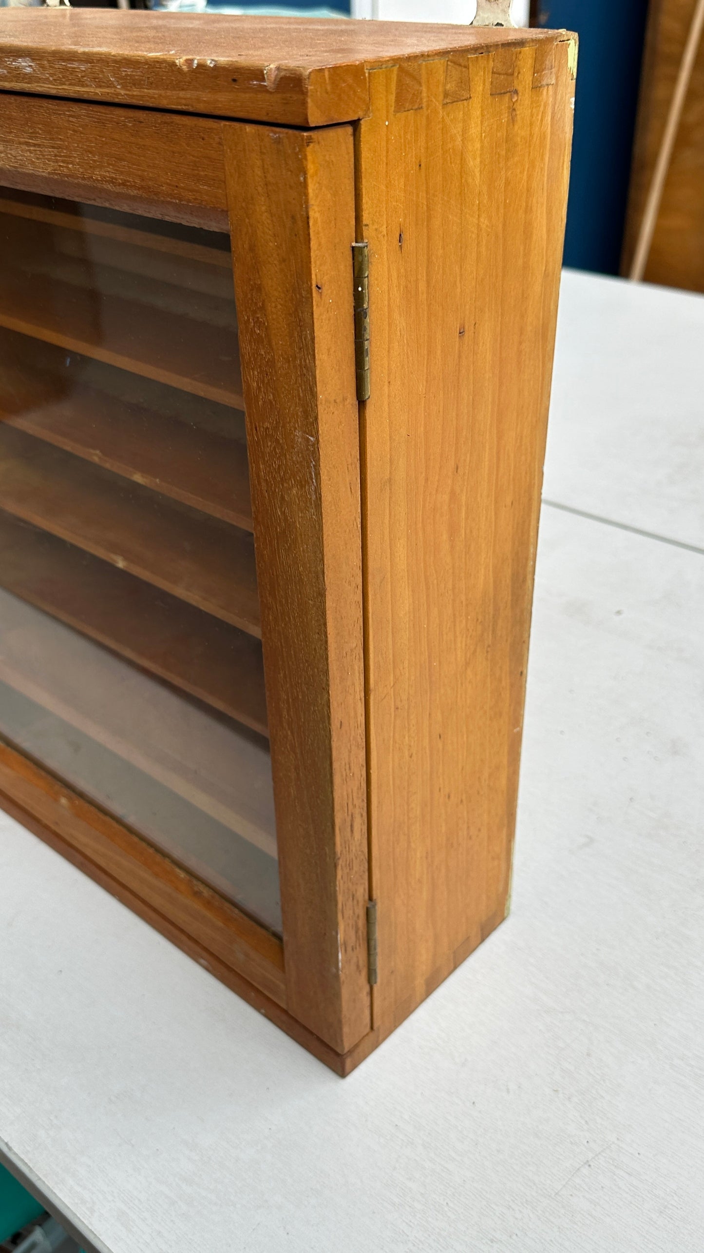 1970s beech wall hanging display cabinet with broad arrow mark to reverse -