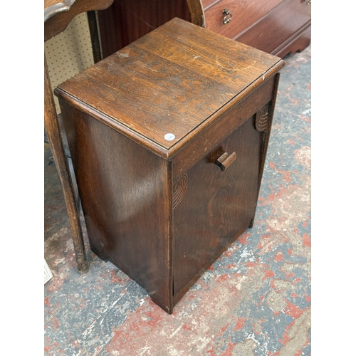 Art Deco carved oak sewing cabinet with contents