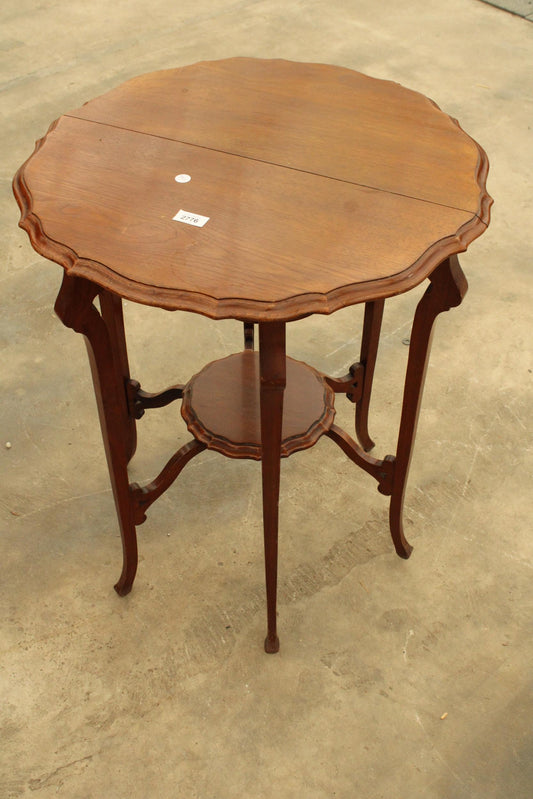 AN EDWARDIAN TWO TIER CENTRE TABLE WITH PIE-CRUST EDGE