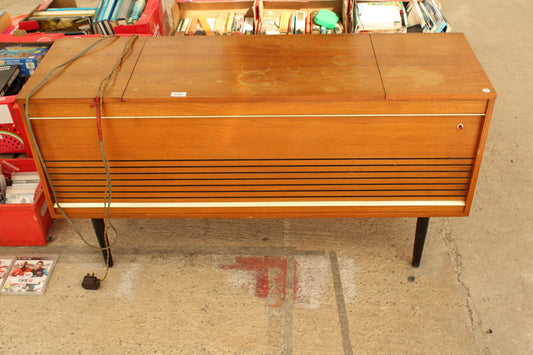 A RETRO TEAK RADIOGRAM WITH MONARCH FIDELITY DECK