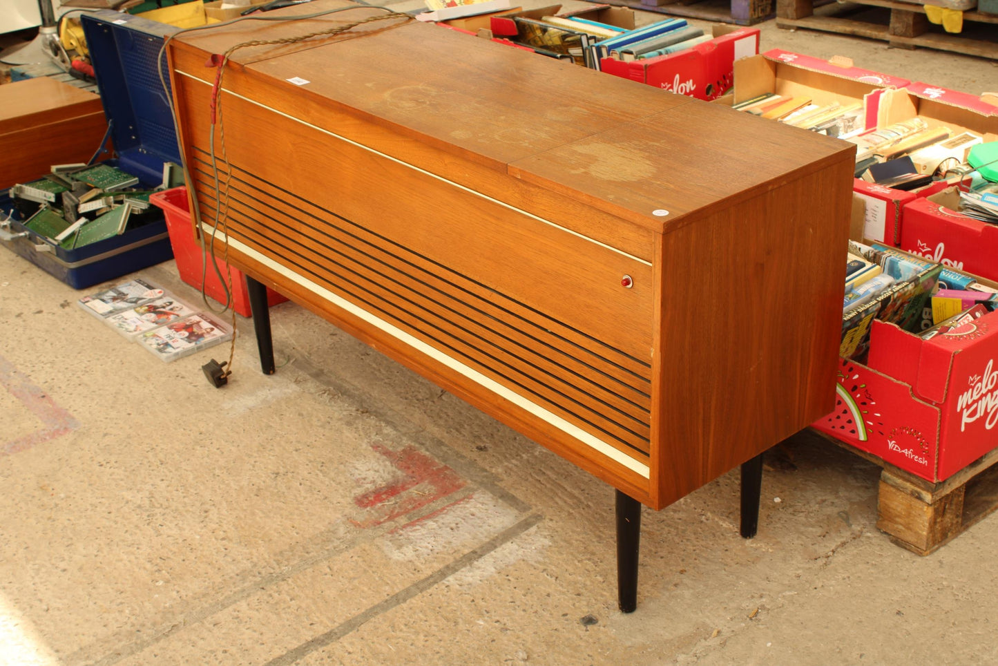 A RETRO TEAK RADIOGRAM WITH MONARCH FIDELITY DECK