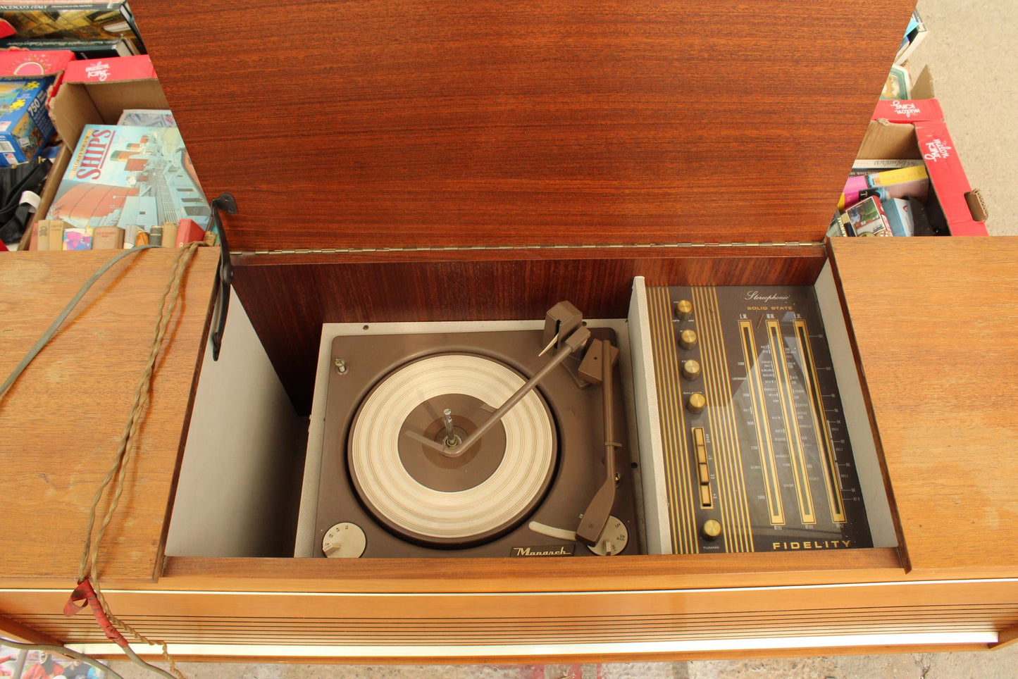 A RETRO TEAK RADIOGRAM WITH MONARCH FIDELITY DECK