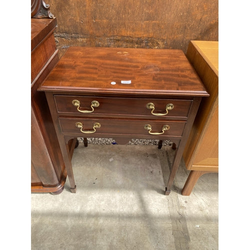 A 19TH CENTURY STYLE MAHOGANY TWO DRAWER SIDE TABLE ON TAPERING LEGS WITH SPADE FEET, 25" WIDE