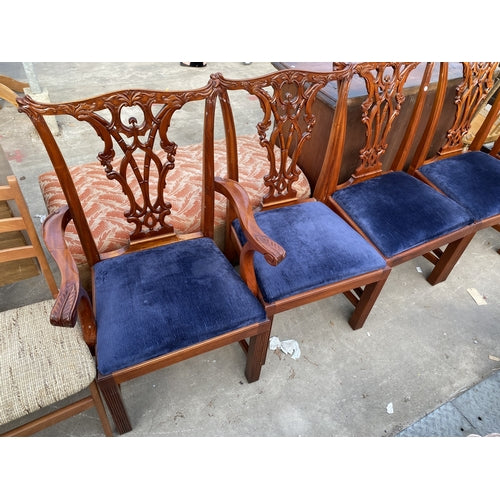A set of 4 CHIPPENDALE STYLE DINING CHAIRS