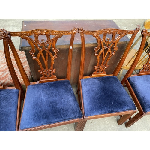 A set of 4 CHIPPENDALE STYLE DINING CHAIRS
