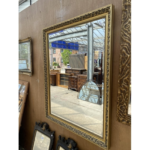 A VINTAGE GILT FRAMED WALL MIRROR WITH BEVEL EDGE, 45" X 35"