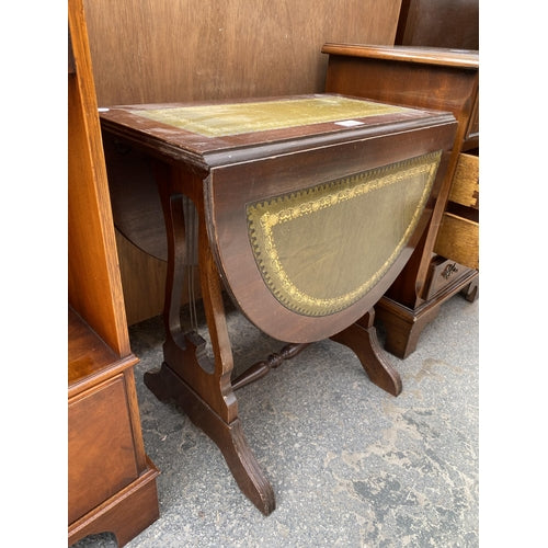 DROP LEAF TABLE WITH LYRE ENDS AND INSET CENTRE TOP.