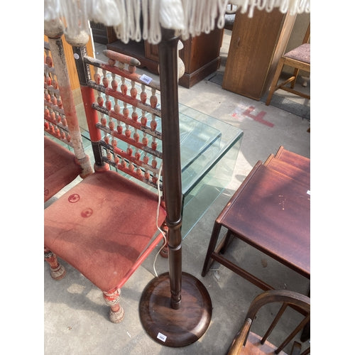 A STANDARD LAMP WITH TURNED COLUMN AND SHADE