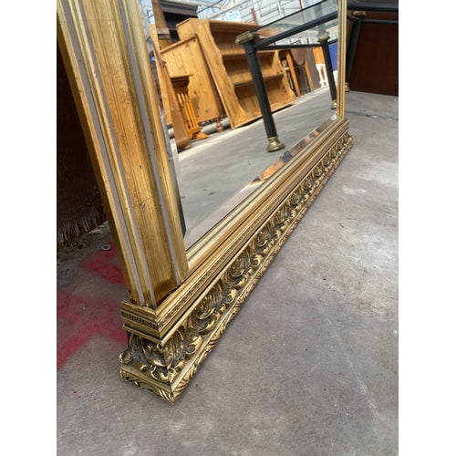 A GILT FRAMED BEVEL EDGE OVERMANTEL MIRROR 42 X 41 INCH