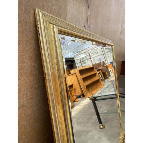 A GILT FRAMED BEVEL EDGE OVERMANTEL MIRROR 42 X 41 INCH
