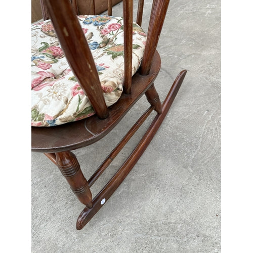 A MAHOGANY ROCKING CHAIR