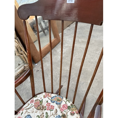 A MAHOGANY ROCKING CHAIR