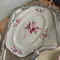 Beautiful earthenware platter features a hand-painted floral pattern in a deep crimson or fuchsia monochrome palette by  Keller & Guérin (K&G)