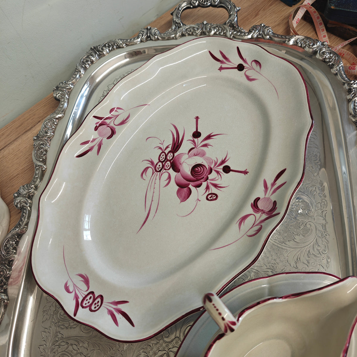 Beautiful earthenware platter features a hand-painted floral pattern in a deep crimson or fuchsia monochrome palette by  Keller & Guérin (K&G)