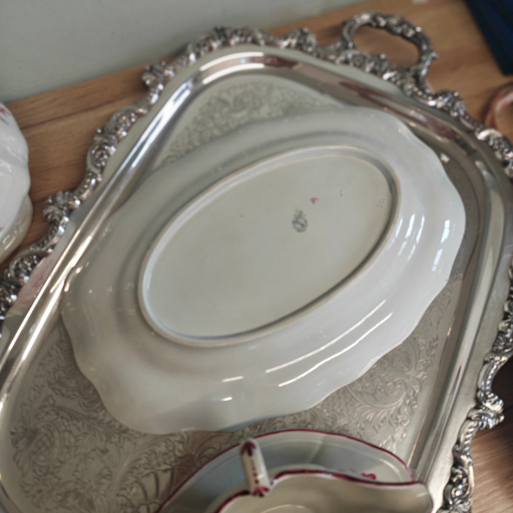 Beautiful earthenware platter features a hand-painted floral pattern in a deep crimson or fuchsia monochrome palette by  Keller & Guérin (K&G)