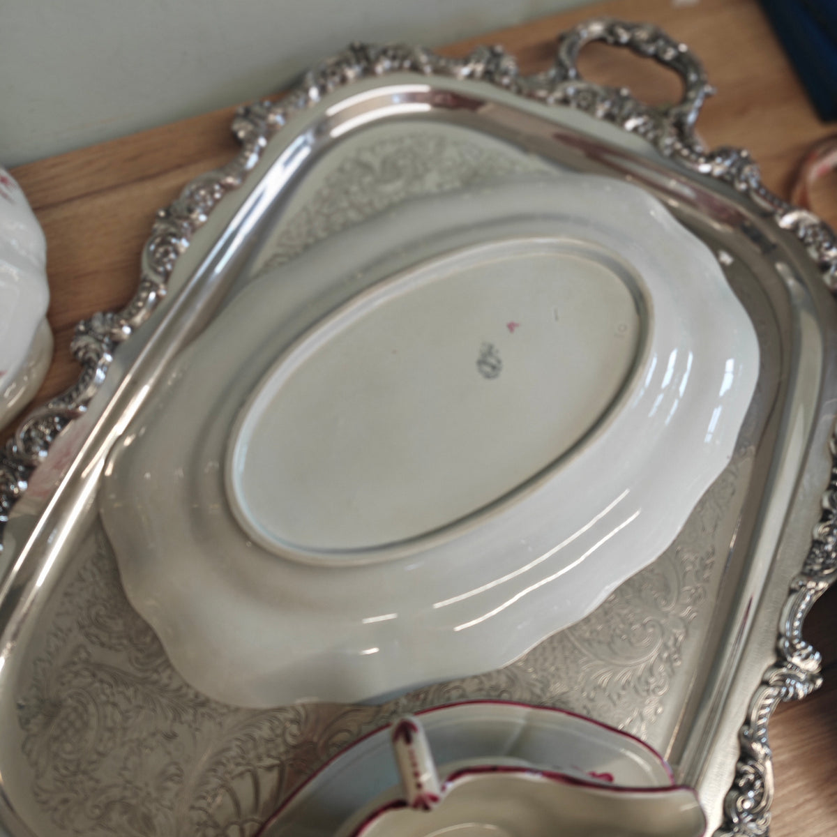Beautiful earthenware platter features a hand-painted floral pattern in a deep crimson or fuchsia monochrome palette by  Keller & Guérin (K&G)