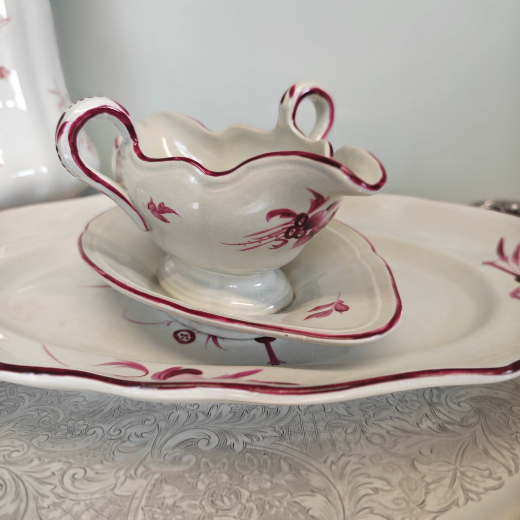 Elegant porcelain sauceboat is an antique Keller &amp; Guérin (K&amp;G) Lunéville sauceboat