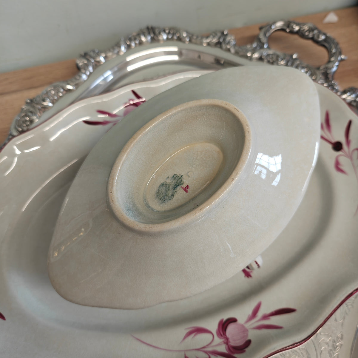 Elegant porcelain sauceboat is an antique Keller &amp; Guérin (K&amp;G) Lunéville sauceboat