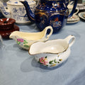 A pair of vintage cute snall gravy bowl