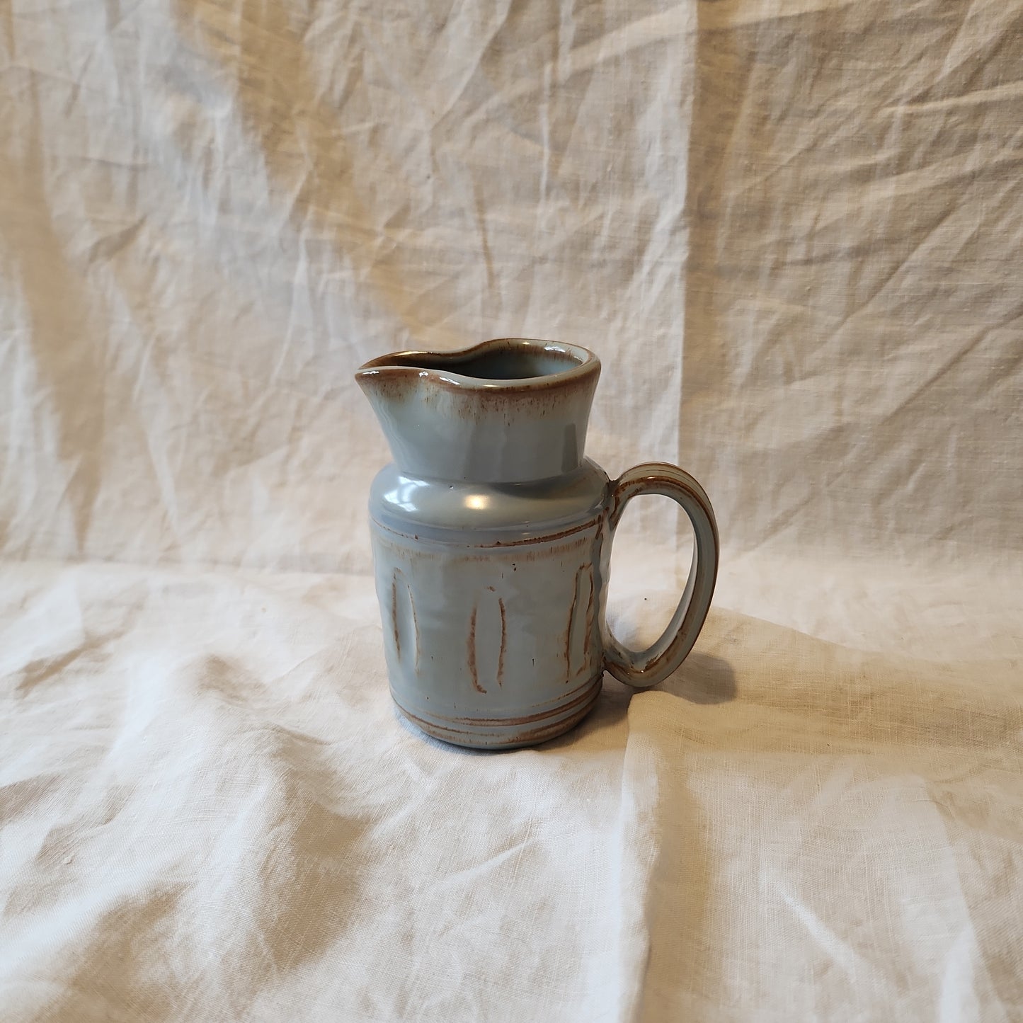Studio pottery jug with imprint Prinknrash