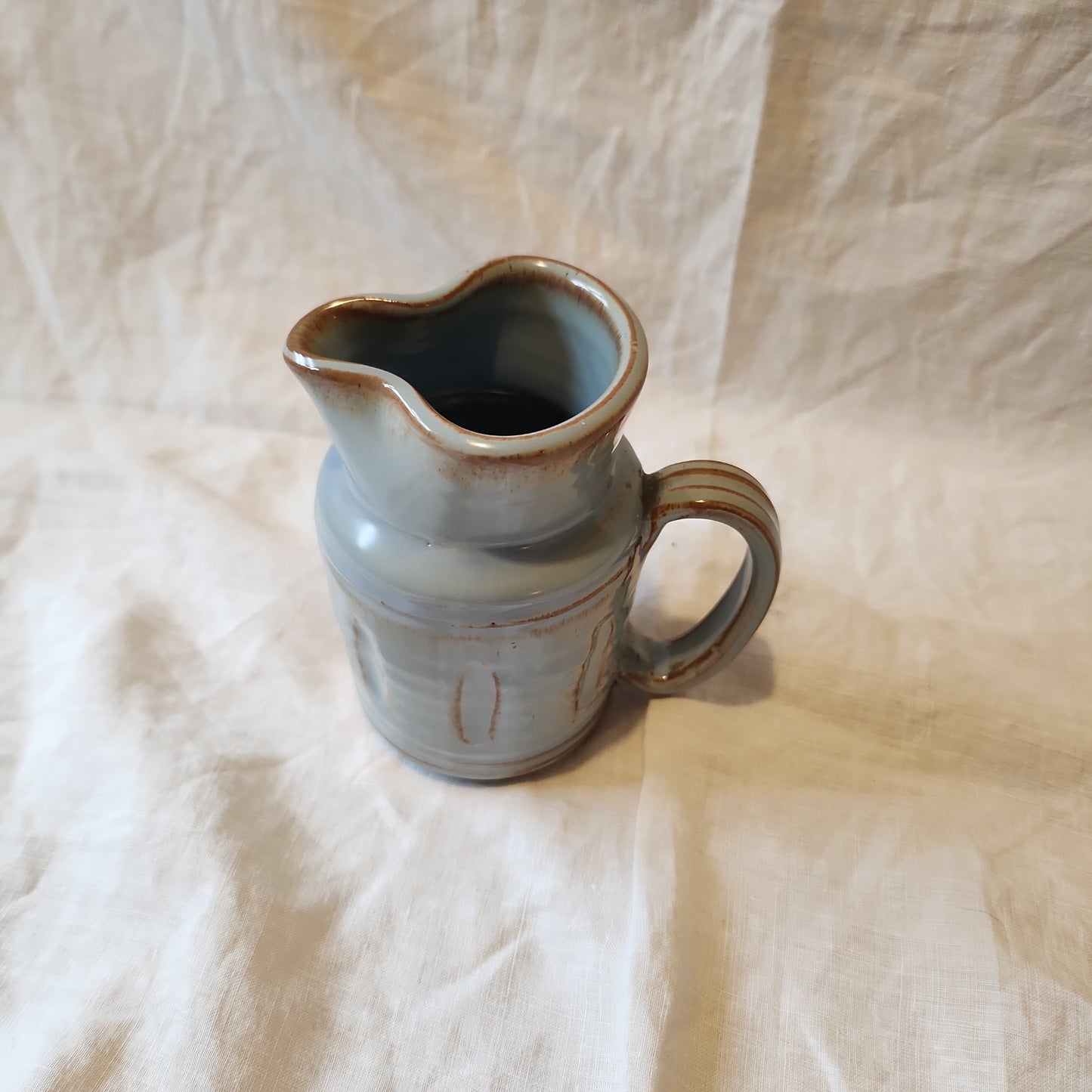 Studio pottery jug with imprint Prinknrash