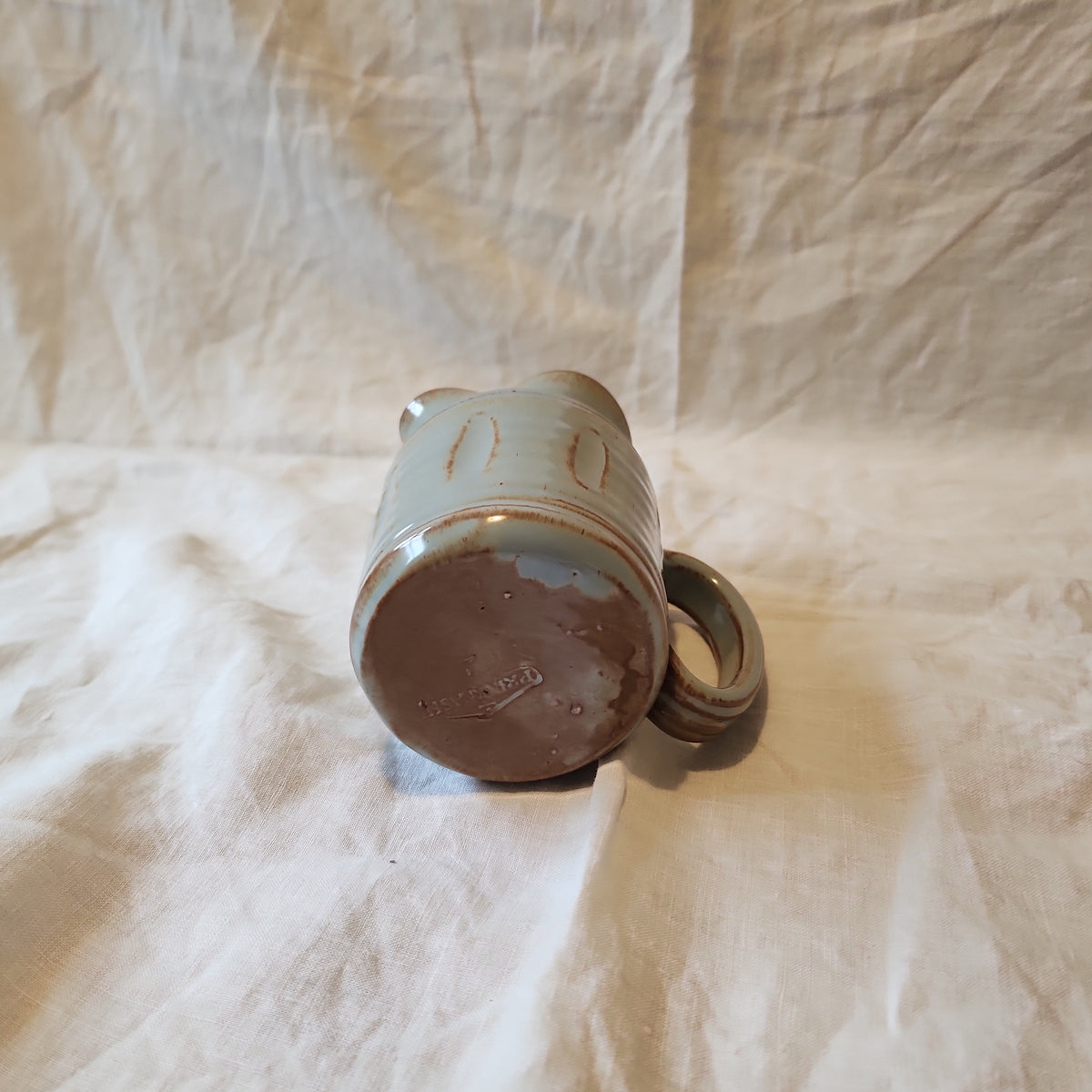 Studio pottery jug with imprint Prinknrash