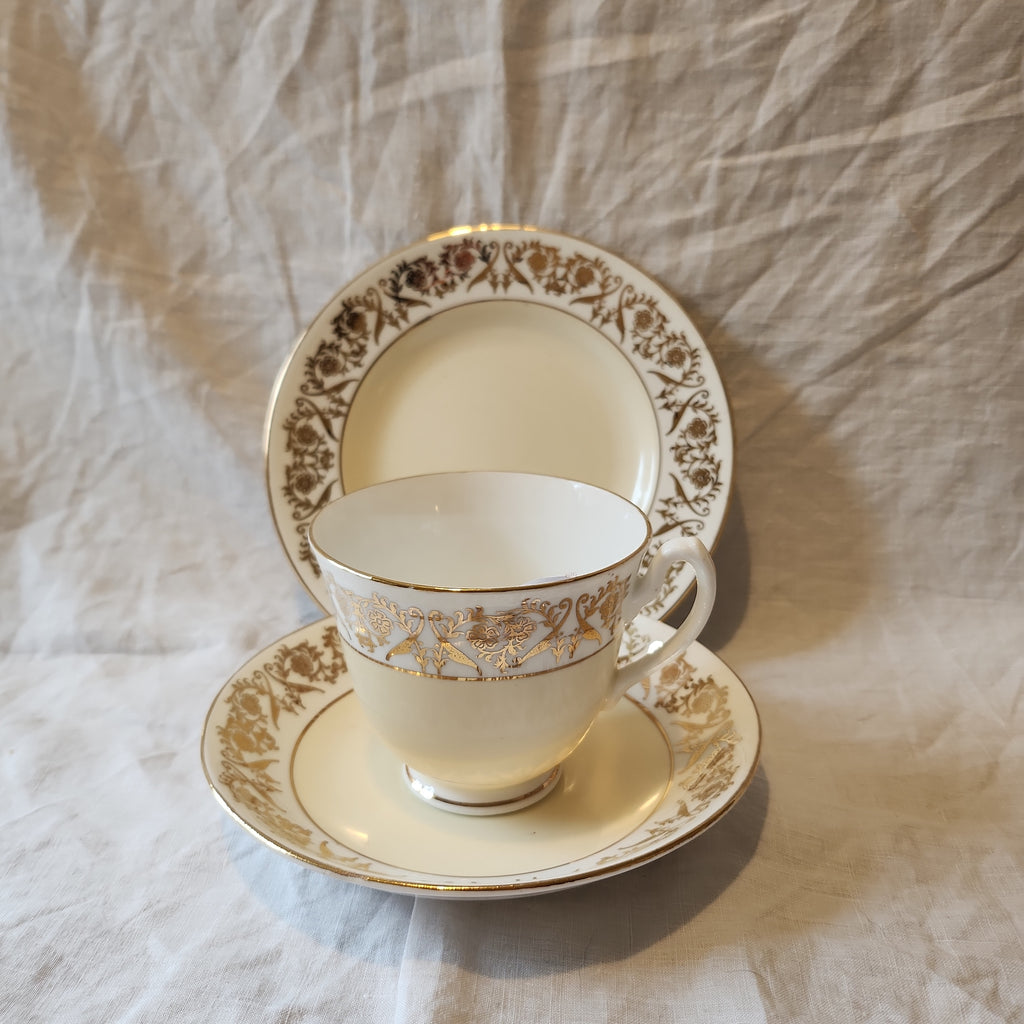Vintage yellow and gold fine bone china tea set trio