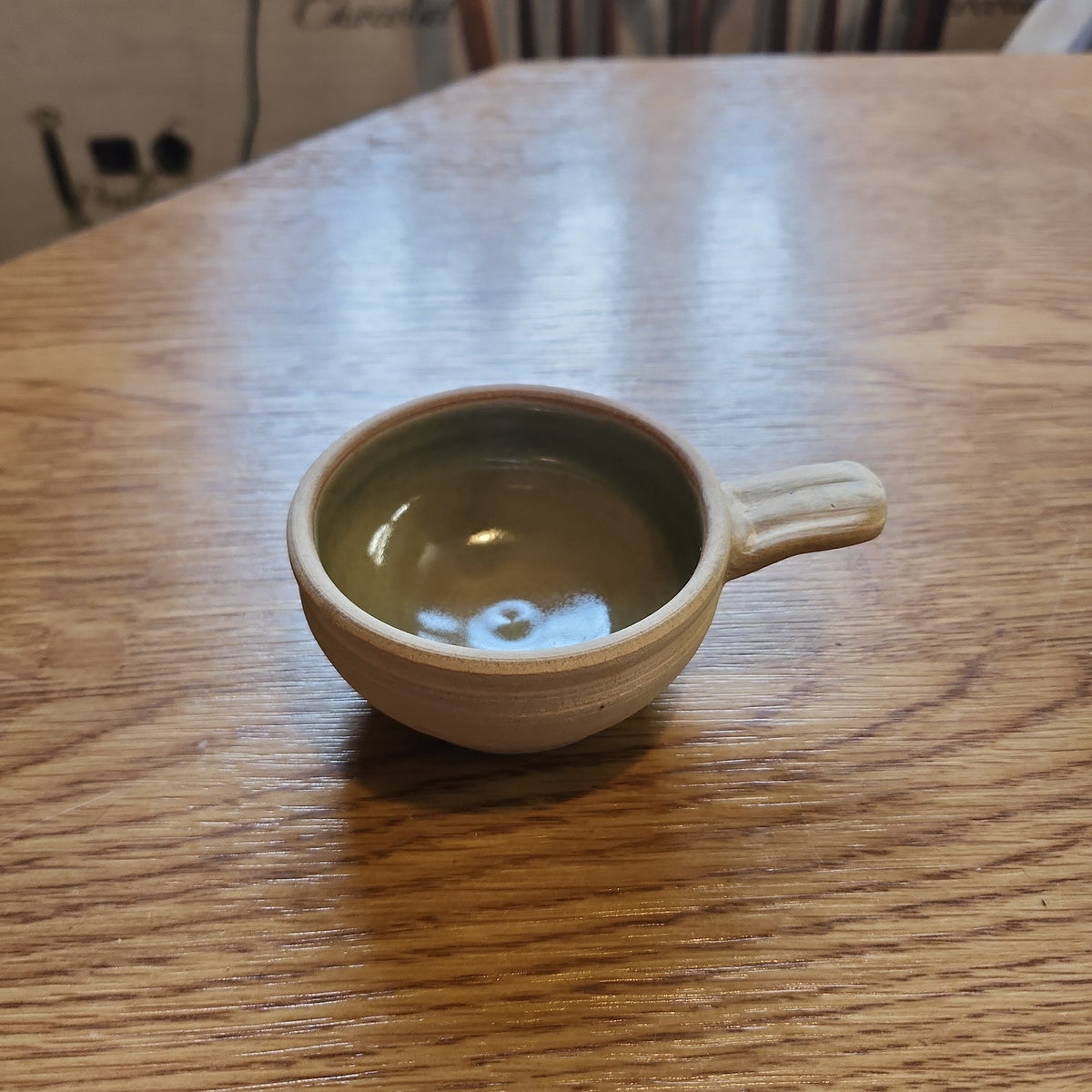 Cute mid century studio pottery small bowl with handle
