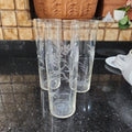 Vintage tall drink glass with etching