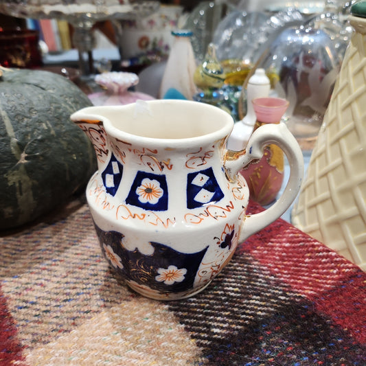 Early period dutchess handpainted imari milk jug